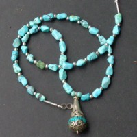 A Nepalese Silver and Turquoise „Drop“-Pendant, Turquoise Beads and tiny Spacers length: 45 cm+ 3 cm; weight: 20 g; prize: € 118