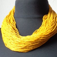 Baule Tamba Belt Necklace, Ivory Coast 105 Strands of yellow Seed Trade Beads from Bohemia length: 58 cm, weight: 412 g, prize: € 190.-