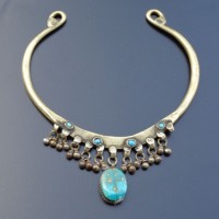 Neck – Ring from Pakistan(? Brass, a fairly large Turquoise and light blue Stones diameter: 12,5 cm, weight: 87 g, prize: € 115,-