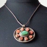 Large and ancient Pendant from Nepal on a Silver-Chain, Silver, Turquoise and Coral diameter( pendant): 7cm , length (chain): 52 cm ,weight: 90 g, prize: € 175,-