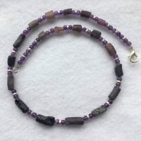 Purple Glass Tubes, said to be cut of Roman Fragments found in Afghanistan, tiny Amethyst Beads ans silver plated rings, Anatolialength: 44 cm weight: 28 gr Price: €140.-