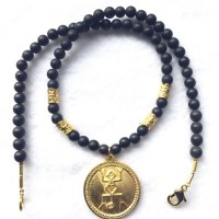 Gold plated Silver Pendant of the Tairona Culture, Onyx Beads and a few gold plated Silver Elementslength: 46 cm weight: 31 gr Price € 162.-