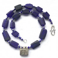 Blue Glass Elements said to be cut of Roman Fragments and a Silver Telsum Amulet, Ethiopialength: 47,5 cm weight: 49 gr price :€ 125.-